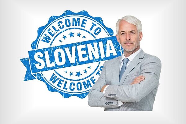  Businessman and logo in background Welcome to Slovenia.